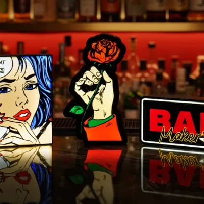 Official MakerLab card showing three colourful illuminated lightbox designs on a bar.