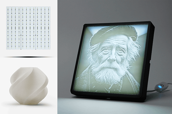 Official MakerLab example of a backlit monochrome lithophane portrait in a black frame.
