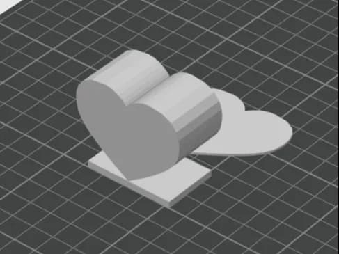 Grijze 3D-weergave van een hartvormige lichtbak met voorzijde, diepe behuizing en losse achterplaat.